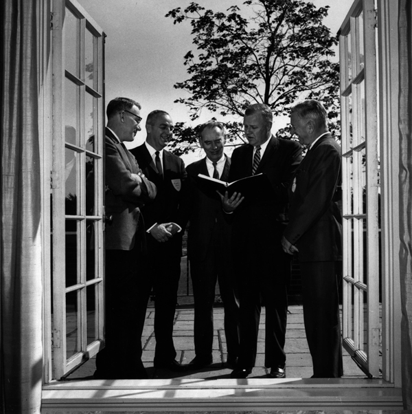 Acting president Leonard Chapin Mead, Tufts administrators John C. Palmer, Frank A. Tredinnick, with two other members of Tufts adminstration, 1966