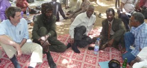Pictured above are, from left to right, WPF executive director Alex de Waal, Suleiman Zakaria, Thabo Mbeki, Ali Haroun in Ain Siro, North Darfur, Sudan (July 2009).