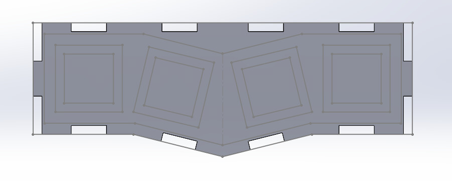 Digital sketch of fidget toy design in SoildWorks. Finger joint rectangles surround the outside lines, and no square holes are cut out.