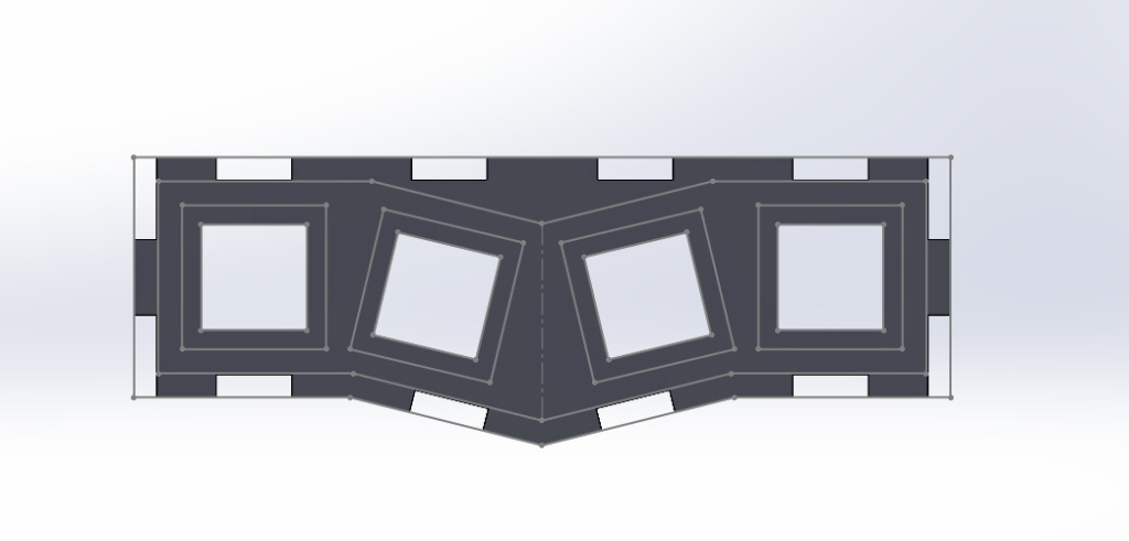 Digital sketch of fidget toy design in SoildWorks. Finger joint rectangles surround the outside lines, and inside square holes are cut out.