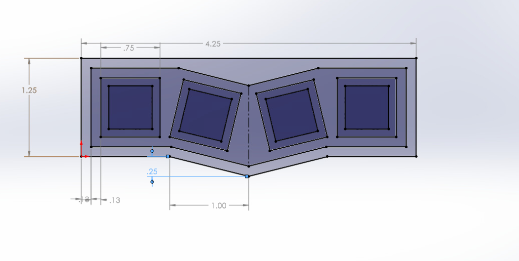 Digital sketch of fidget toy design in SoildWorks. Four square holes, each with a smaller square within. Outer four holes are to fit keycaps, while inner four holes are to fit switches.