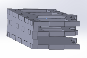 SolidWorks three dimensional assembly with the previously defined panels: the top, middle, bottom plates and the back panel. The finger holes on the back panel fit well with the protrusions from the plates.