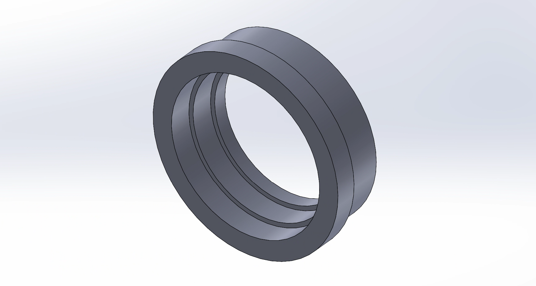 Ring-like design, viewed from an angle below. Three different inner diameters and corresponding wall thicknesses are visible. Only two different diameters exist on the outside edges of the ring.