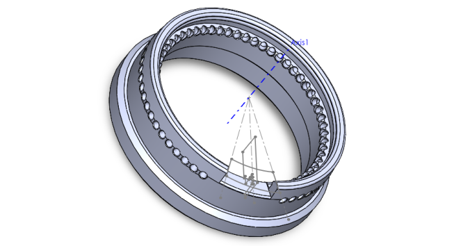 Finished design of petri-dish holder. Resembles a ring, with holes along the top edge, a 30 degree slice cut out, and protruding bottom edge.