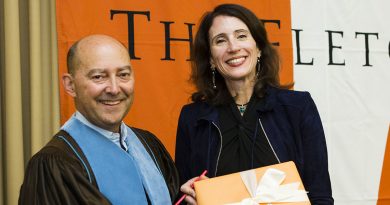 Photo of Dean Stavridis awarding Professor Jenny Aker with the Faculty Research Award during the annual Fletcher Convocation ceremony on Sept. 8. 2017.