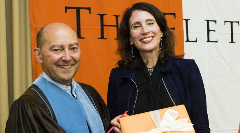 Photo of Dean Stavridis awarding Professor Jenny Aker with the Faculty Research Award during the annual Fletcher Convocation ceremony on Sept. 8. 2017.