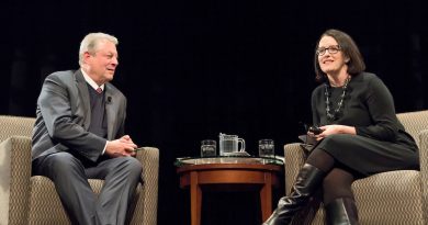 Photo of Kelly Sims Gallagher moderating a conversation (onstage) with Al Gore