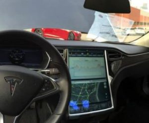 Photo of the inside dashboard of a Tesla