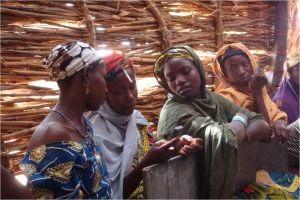 Photo of locals in Loga village