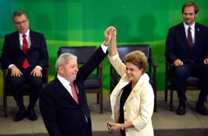 Former President Luiz Inácio Lula da Silva (L) with his successor Dilma Rousseff in March 2016. Wikimedia/Creative Commons, Agência Brasil/José Cruz.