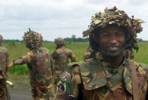 Nigerian Army Special Forces Soldiers performing security operations at Roberts International Airport in Liberia, on Aug. 8, 2003. U.S. Department of Defense, Nathan E. Eason.