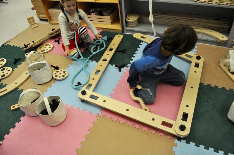 EPCS students investigating concepts in physics and geometry while engaging in collaborative play at the Evelyn G. Pitcher Curriculum Lab housed in the E-P Department of Child Study and Human Development.