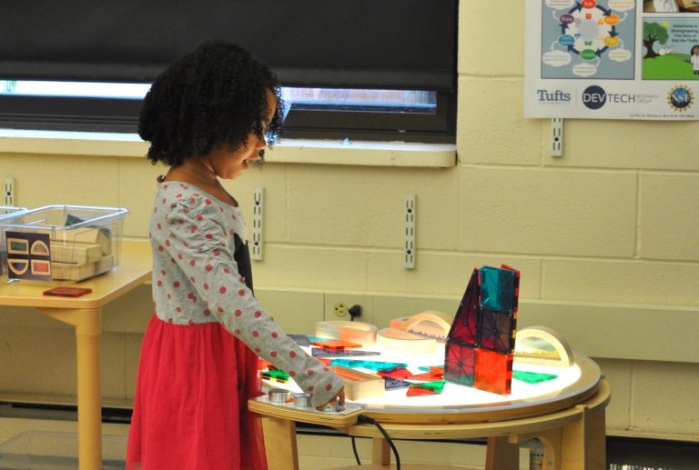 One of our young investigators sings as she explores the properties of light, colors and shapes while visiting the Evelyn G. Pitcher Curriculum Lab in the EP Department of Child Study and Human Development.