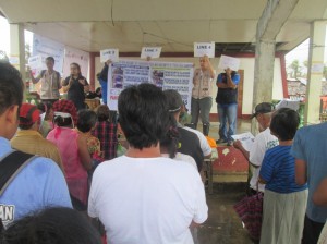Hygiene promotion during shelter and WASH kit distribution in Eastern Samar for Typhoon Hagupit emergency response, 2014
