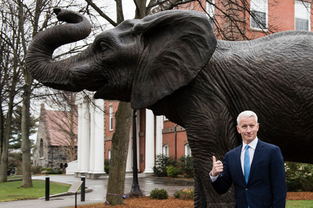04/11/2016 - Medford/Somerville, Mass. - Anderson Cooper, anchor of CNN’s “Anderson Cooper 360°,” poses for a photo ith Jumbo on the Academic Quad at Tufts University on April 11, 2016. (Alonso Nichols/Tufts University)