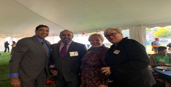 Birendra with Fletcher administrators at commencement