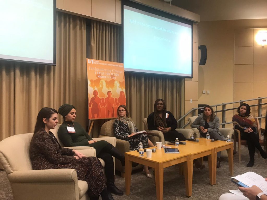 A photograph of Anna Rivina speaking on a panel of international activists at the 2019 Conference on Gender and International Affairs at The Fletcher School.