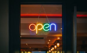 A neon sign saying "open"