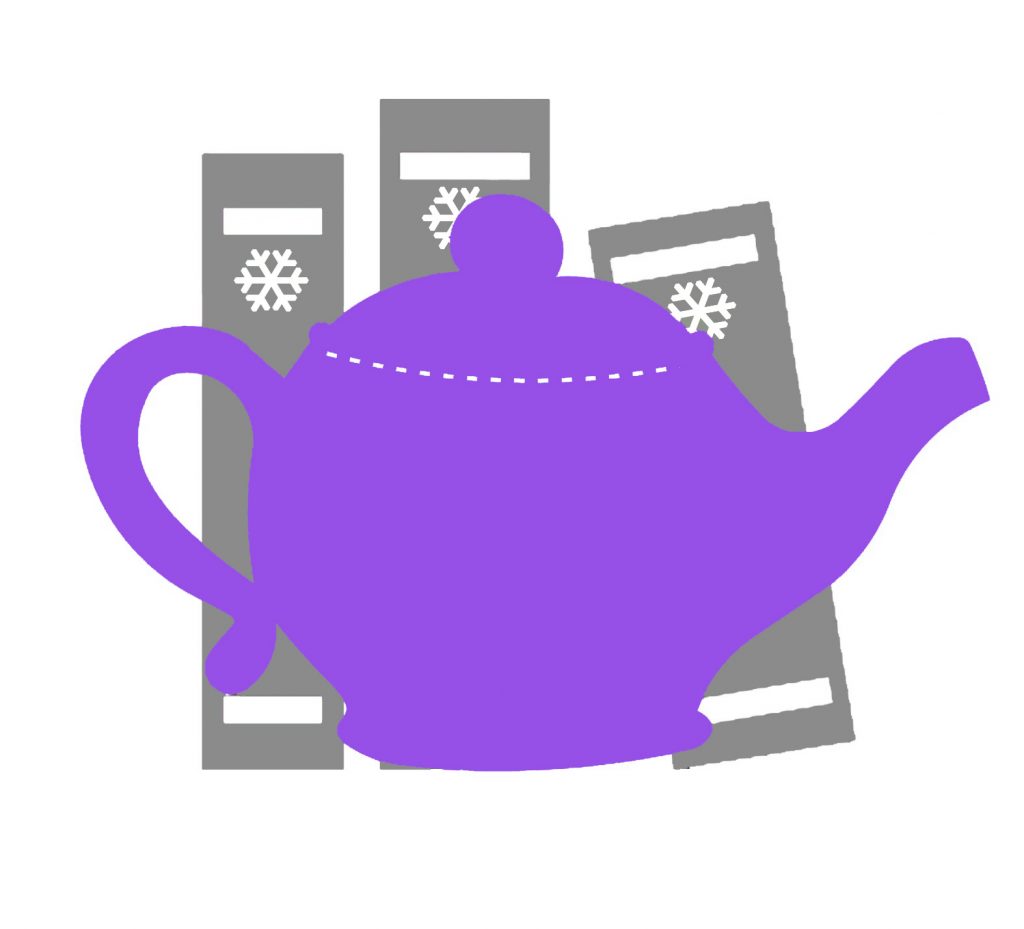 Teapot in front of books