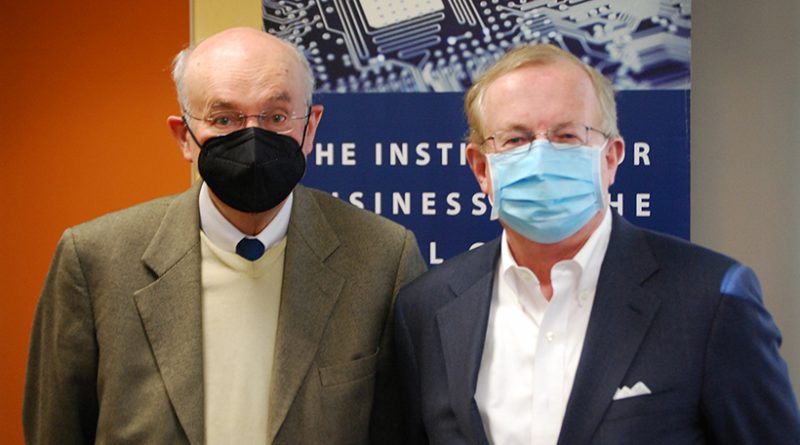 Left to right professor Laurent Jacque wearing beige jacket and Dr. Paul Toldalagi wearing blue suit jacket