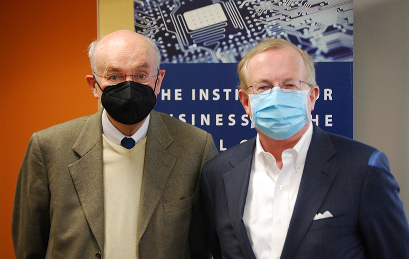 Left to right professor Laurent Jacque wearing beige jacket and Dr. Paul Toldalagi wearing blue suit jacket