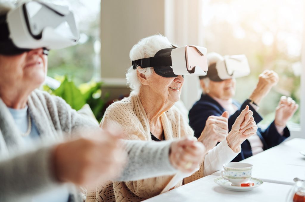 senior citizens using VR headsets