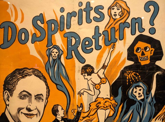 A poster with humans and spirits depicted with the questions "do spirits return?"