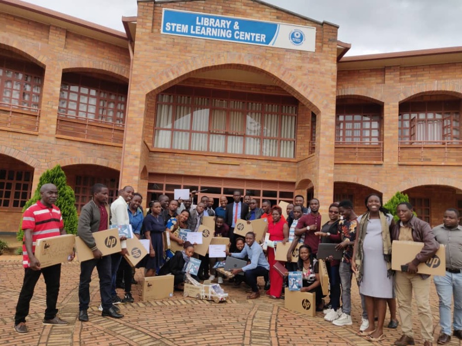 Rwandan teachers celebrate after completing teacher training