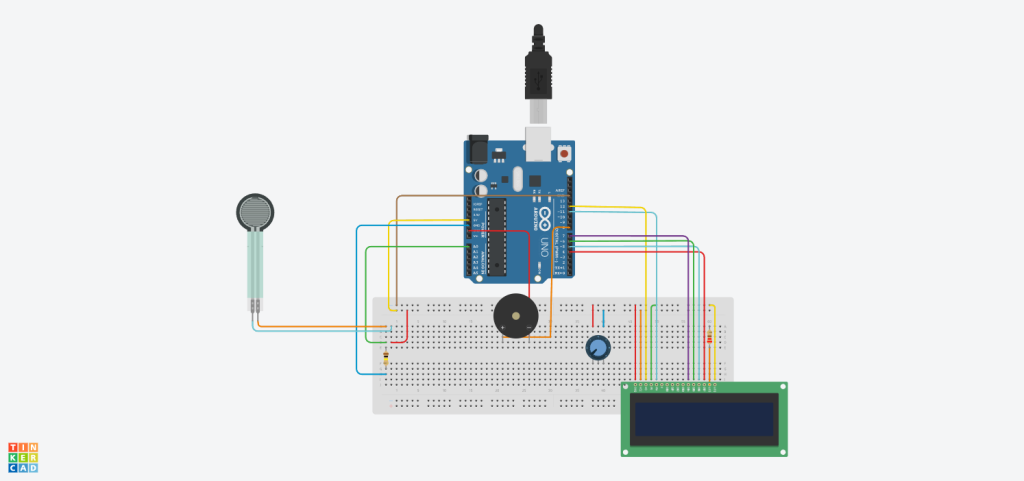 TinkerCAD design of the sensor, buzzer, LCD, and Arduino system.