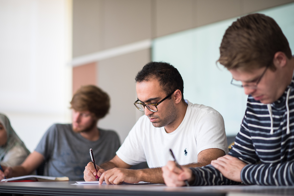 Graduate students in Tufts' Tisch College of Civic Life in a workshop at Lincoln Filene Hall. (Ian MacLellan for Tufts University)