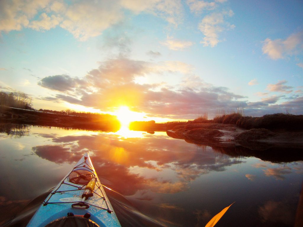 kayaking with sunset